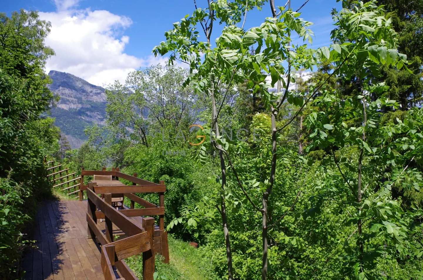 CHALET IN THE HEART OF NATURE OF 120 M2 ON A LAND OF 1609M2 - Photo 8 of 11