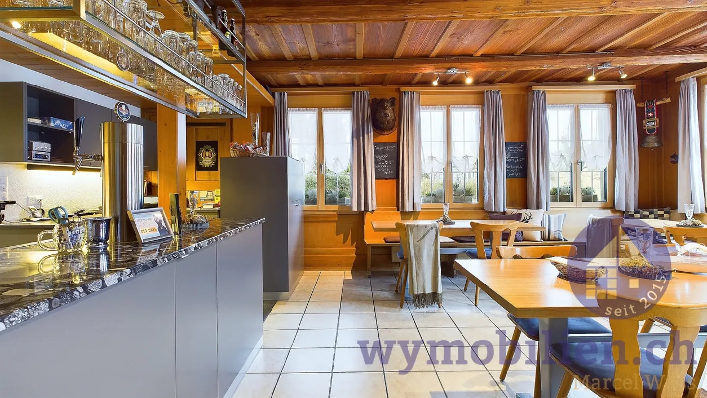 Triple Attrayant : Appartements Minergie, Auberge Rentable + Terrain à Bâtir ! - Photo 5 sur 11