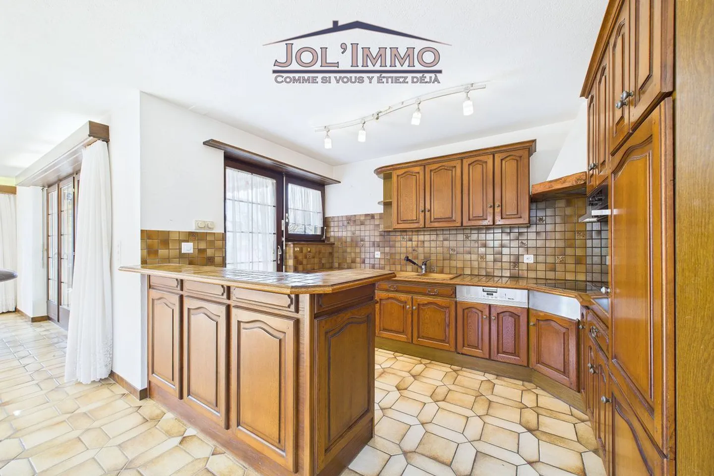 Familienhaus mit großzügigen Volumen und großem Garten in Courrendlin - Foto 6 von 13