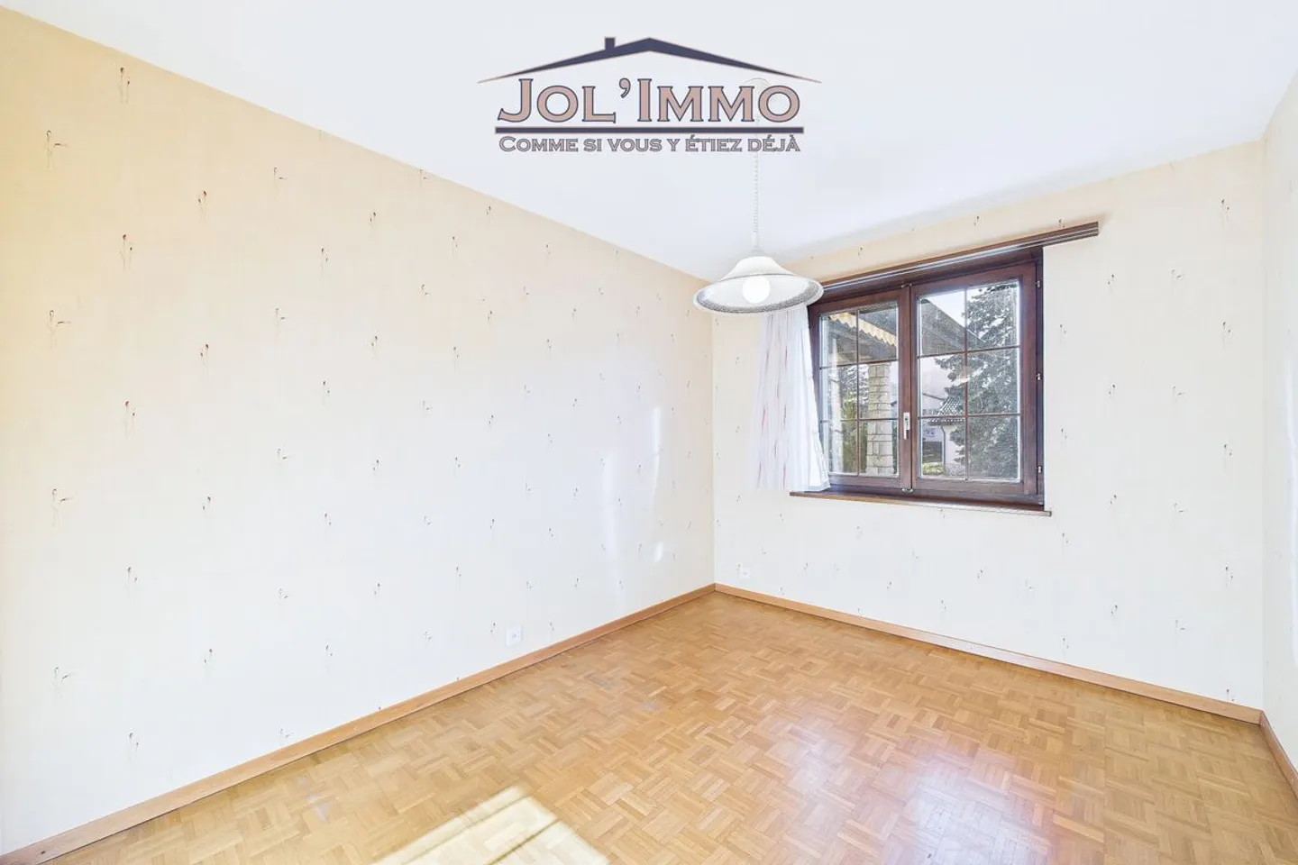 Familienhaus mit großzügigen Volumen und großem Garten in Courrendlin - Foto 9 von 13