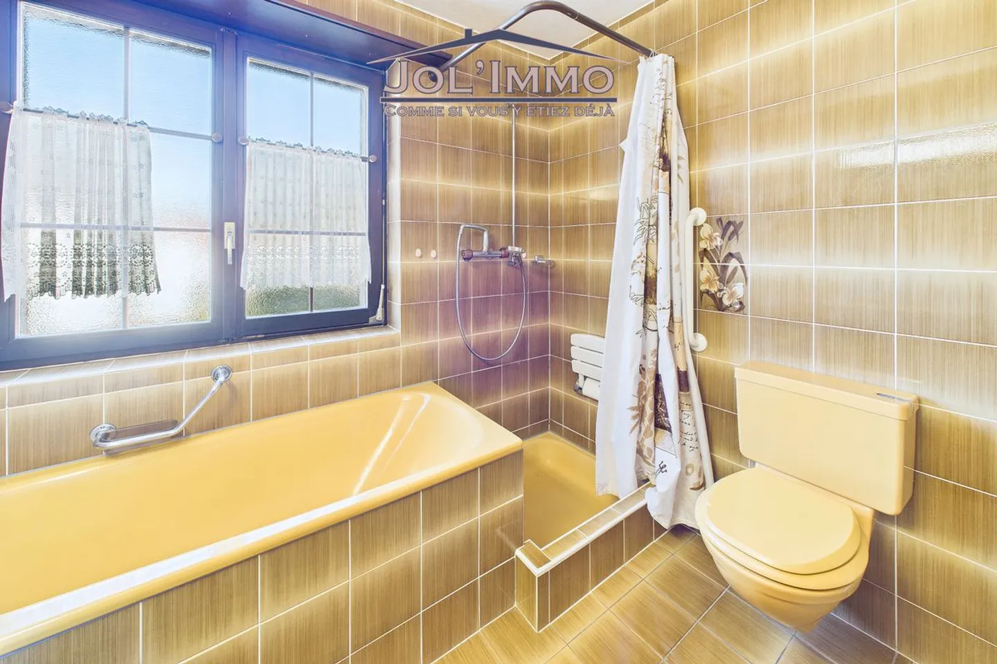 Familienhaus mit großzügigen Volumen und großem Garten in Courrendlin - Foto 12 von 13