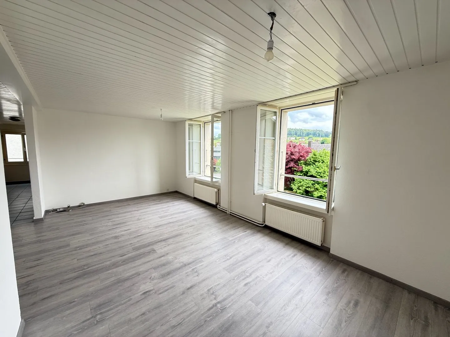 Rez de chaussée - Appartement pratique et abordable avec place de parc et JARDIN COMMUN - Photo 7 sur 13