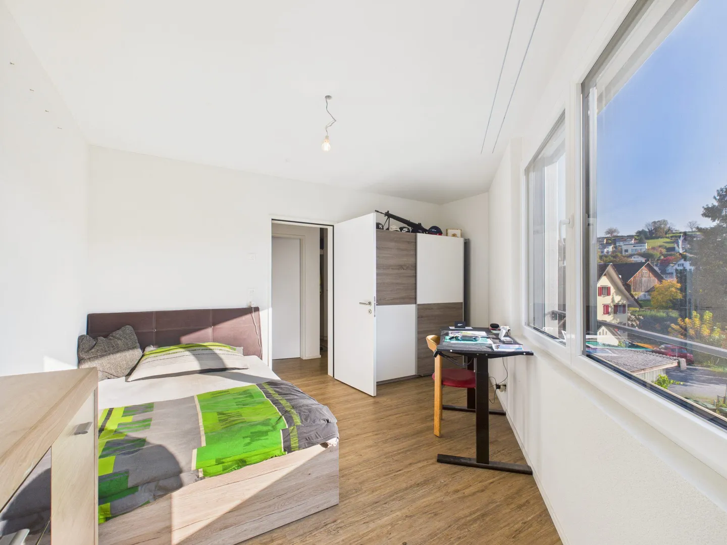 Modern 3.5-room apartment in a quiet location in the heart of Benken SG - Photo 7 of 9