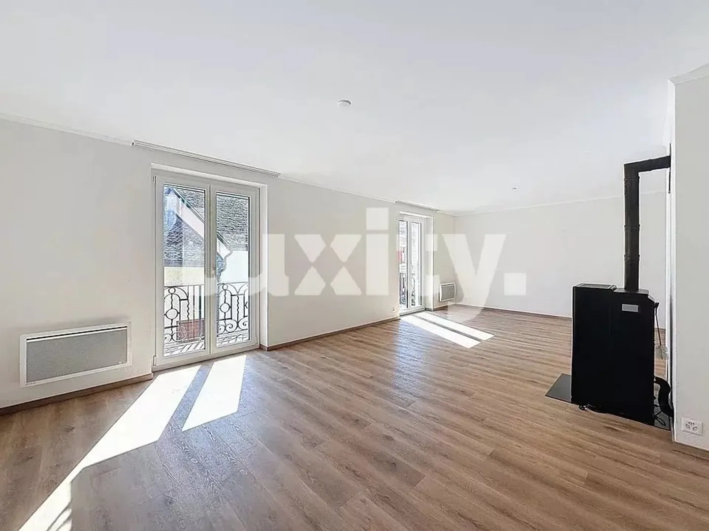 For rent in Crassier: a rare living environment between modern comfort and tranquility. - Photo 2 of 7