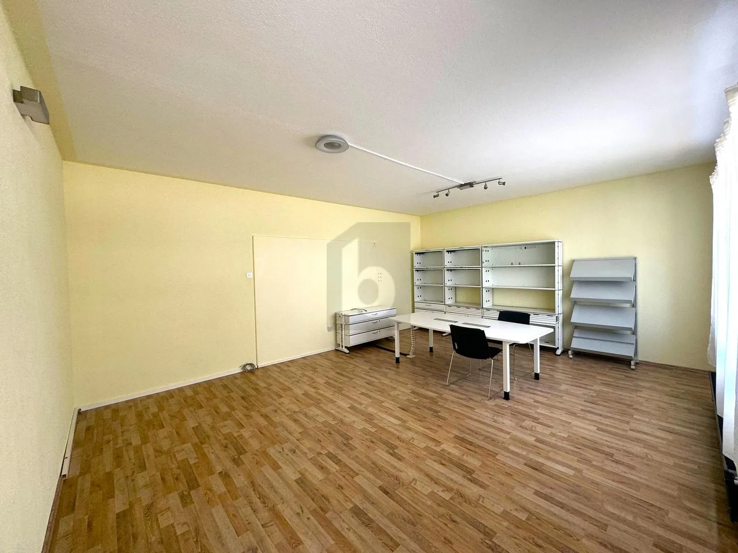 BRIGHT OFFICE SPACE WITH LARGE DISPLAY WINDOWS - Photo 5 of 6