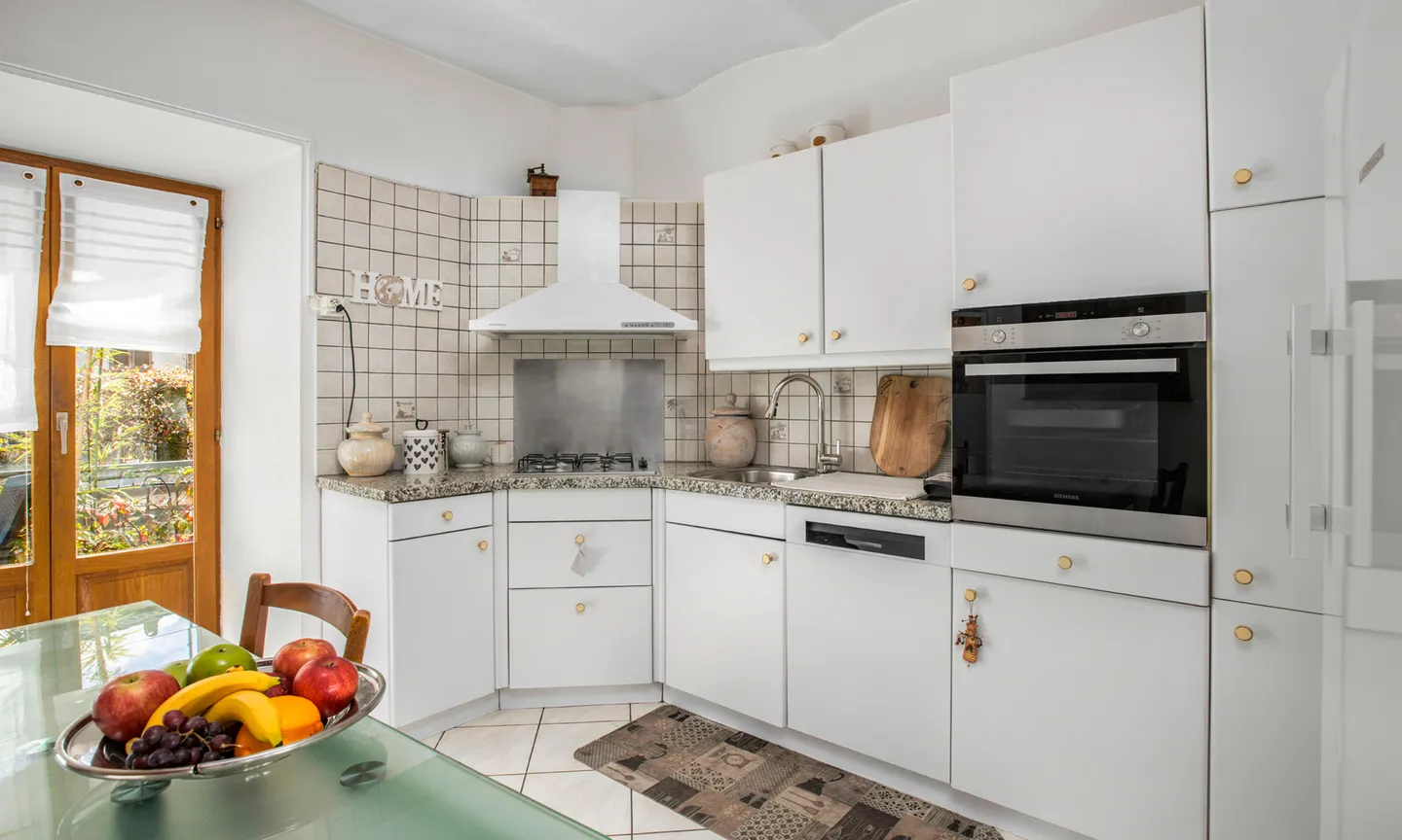 ZWEIFAMILIENHAUS MIT 7 ZIMMERN UND TERRASSE IN CURIO - Foto 10 von 13