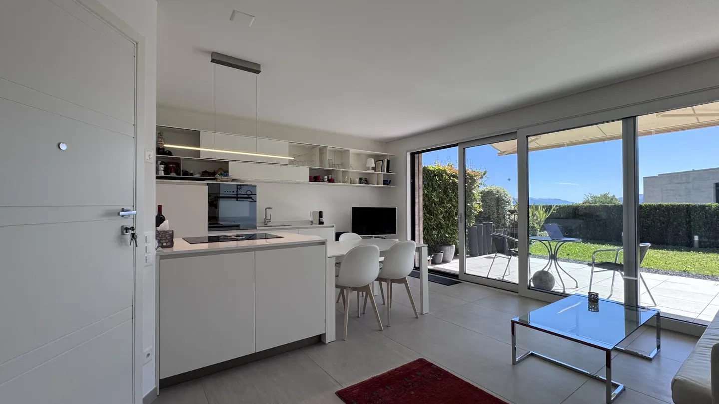 SUPERBE APPARTEMENT 2.5 PIÈCES HAUT STANDING AVEC JARDIN À CADRO - Photo 12 sur 12