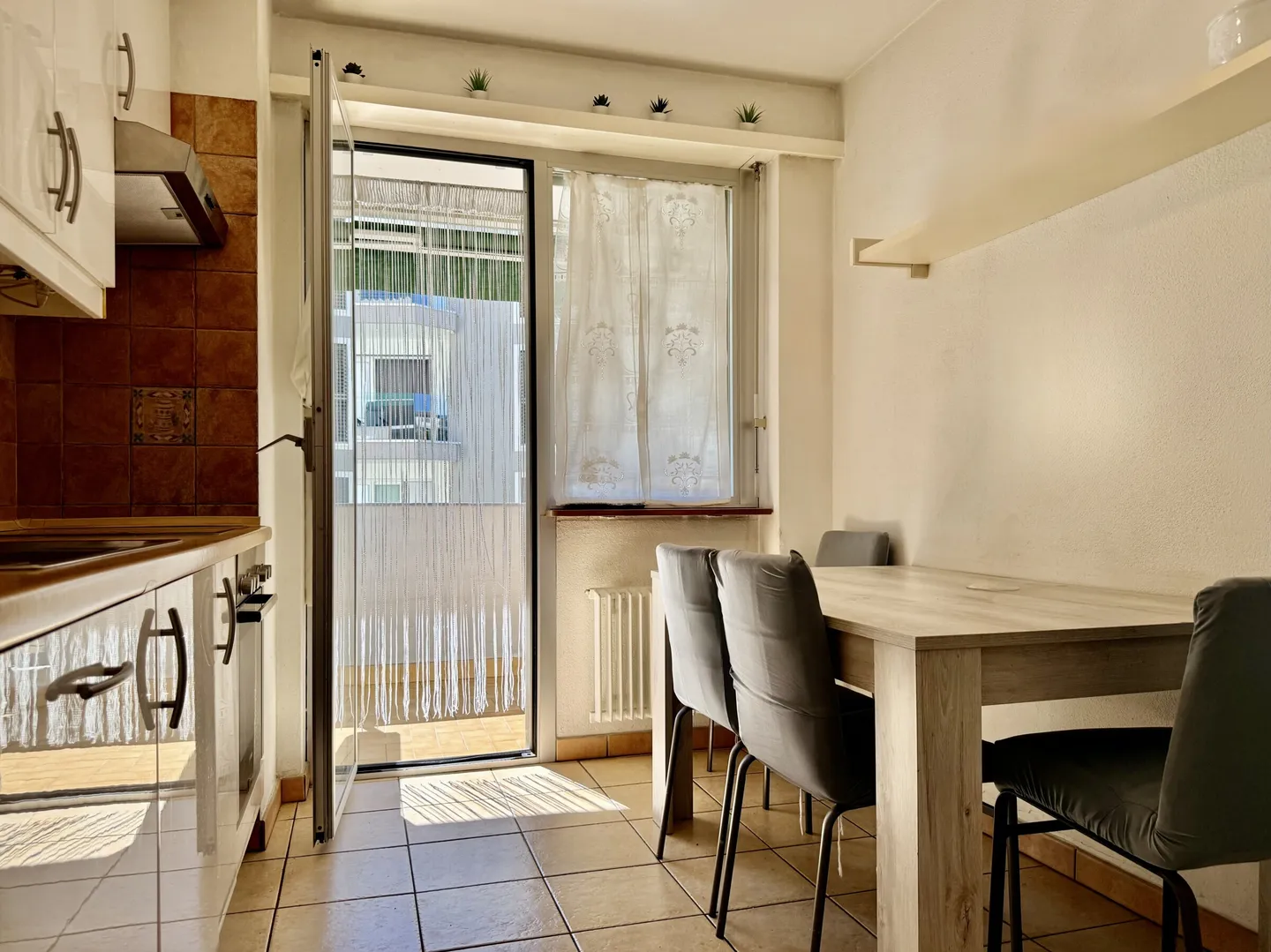 SPACIEUX 3.5 PIÈCES AVEC DEUX TERRASSES À MORBIO INFERIORE - Photo 3 sur 9