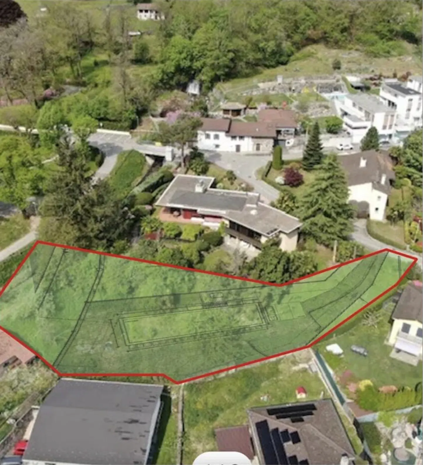 TERRAIN CONSTRUCTIBLE SPACIEUX AVEC PROJET APPROUVÉ À MEZZOVICO - Photo 1 sur 6