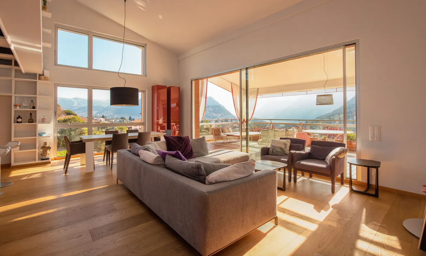 SUPER DUPLEX ATTIC 7.5 + LAKE VIEW AND POOL IN MONTAGNOLA - Photo 1 of 9