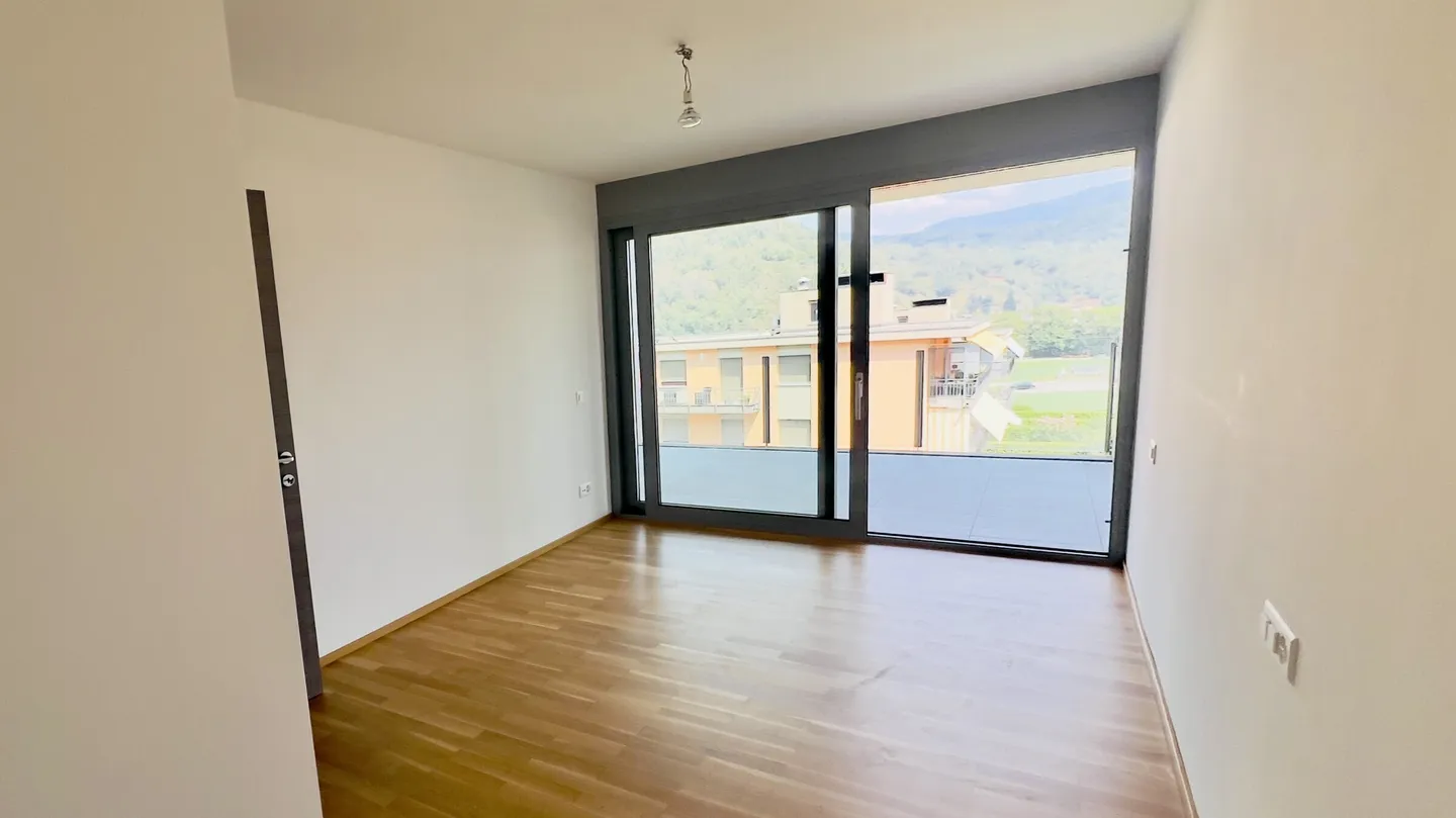 MODERN AND BRIGHT 2.5 ROOMS WITH LARGE TERRACE IN GRAVESANO - Photo 5 of 10
