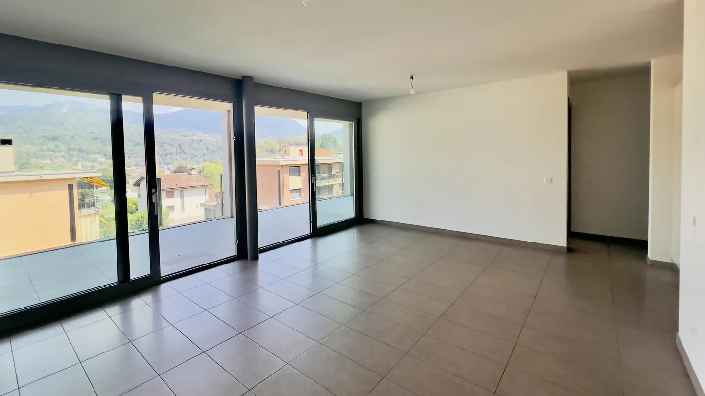 MODERN AND BRIGHT 2.5 ROOMS WITH LARGE TERRACE IN GRAVESANO - Photo 2 of 10