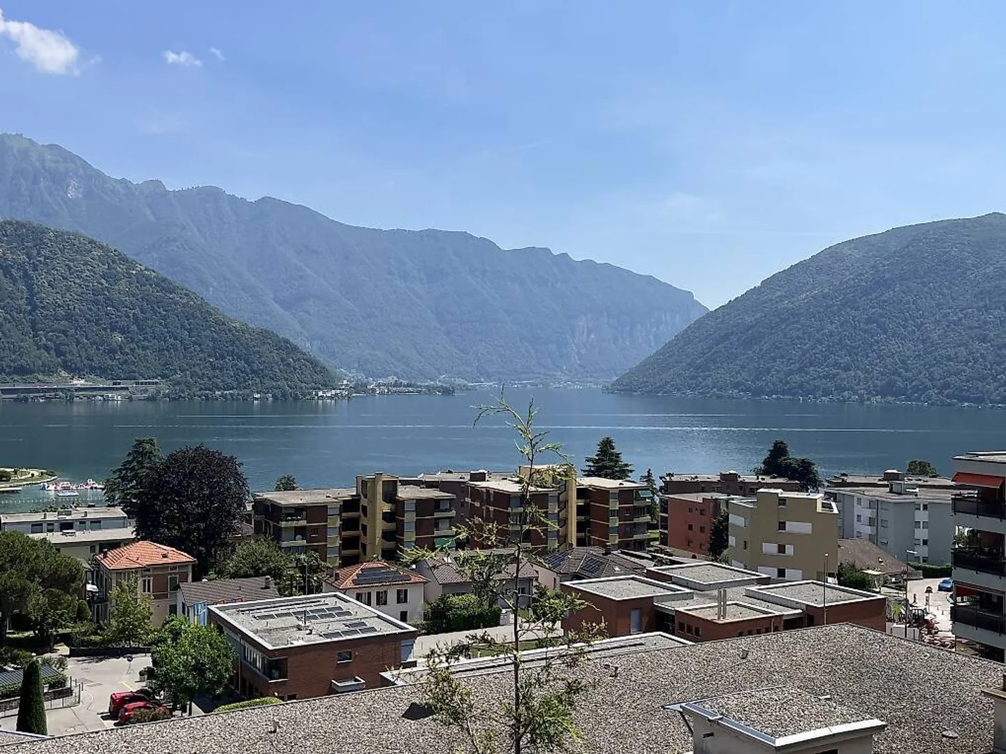 NUOVI MODERNI 4.5 LOCALI CON GIARDINO E VISTA LAGO A MELIDE - Foto 4 von 10