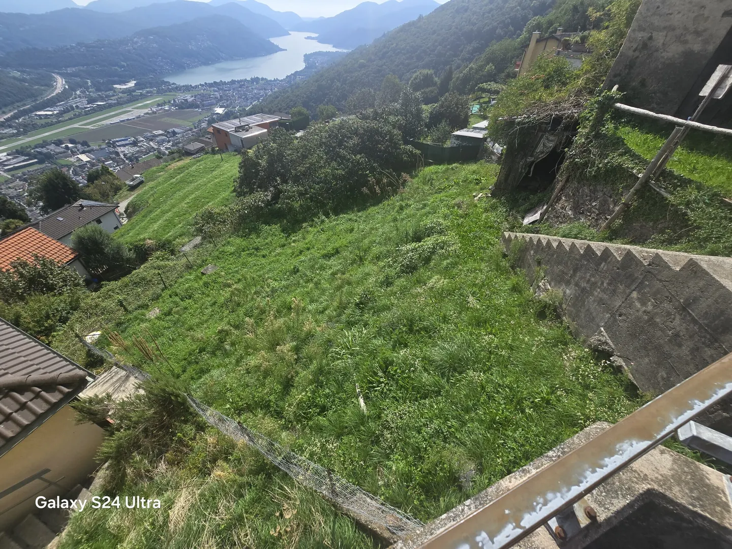BUILDABLE LAND WITH RUSTIC LAKE VIEW IN CADEMARIO - Photo 1 of 9