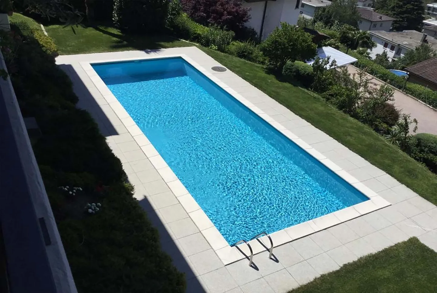 2.5 ROOMS WITH TERRACE IN A RESIDENCE WITH SWIMMING POOL IN COMANO - Photo 2 of 9