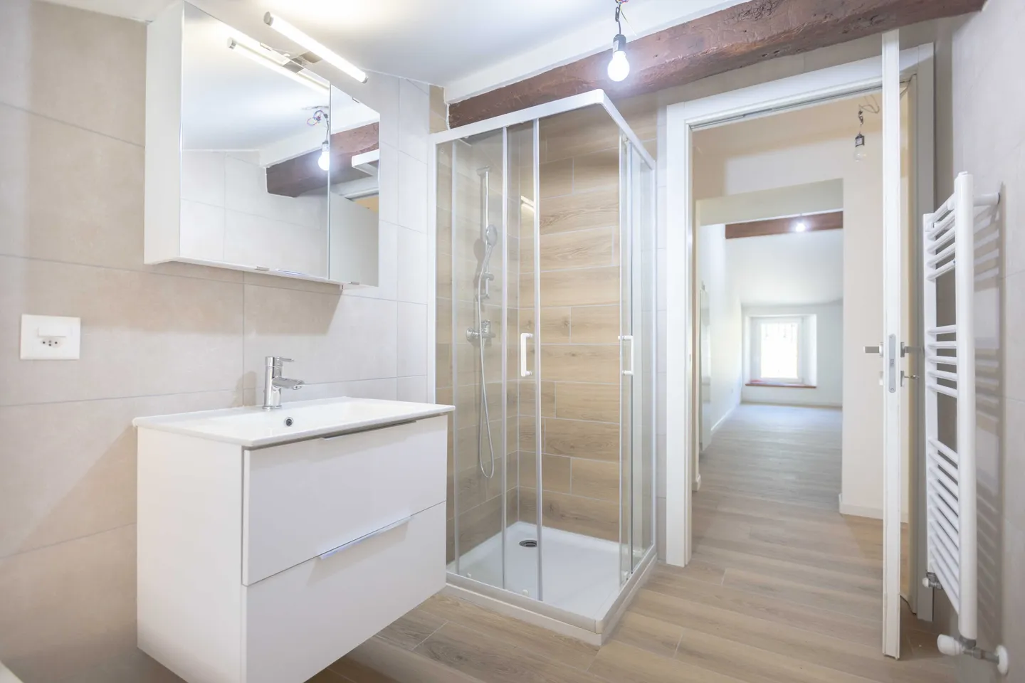 APPARTAMENTO 2.5 LOCALI MANSARDATO E RINNOVATO A CAPOLAGO - Foto 5 di 9