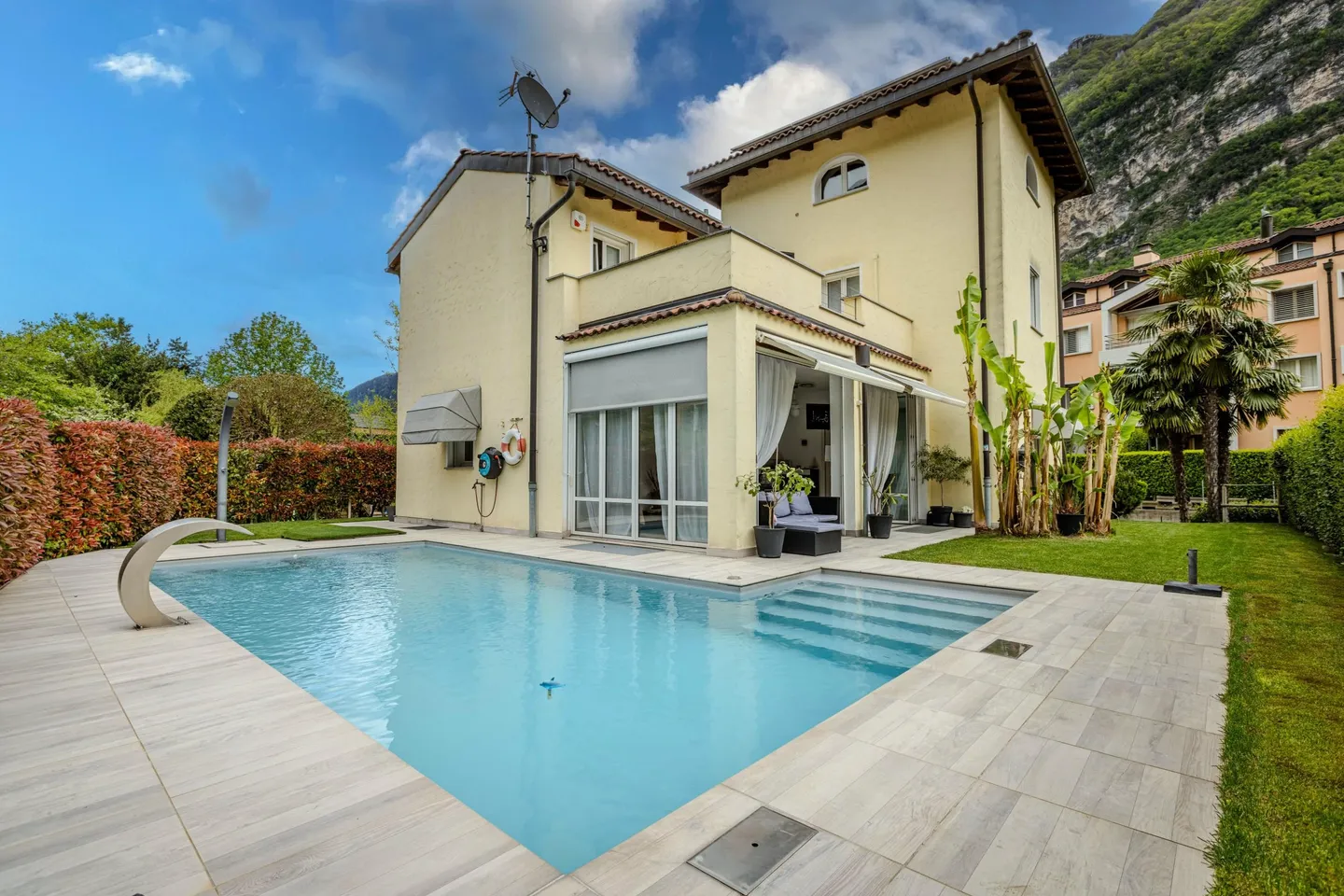 VILLA 7.5 WITH TERRACES, GARDEN AND SWIMMING POOL IN RIVA SAN VITALE - Photo 1 of 9