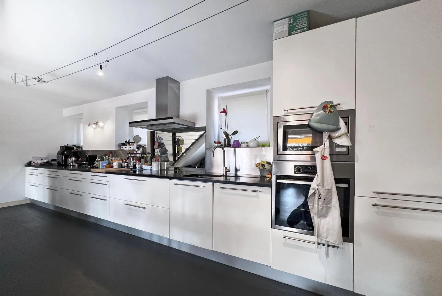 SPAZIOSO DUPLEX 3.5 LOCALI CON GIARDINO PRIVATO AD AGNO - Foto 3 di 11