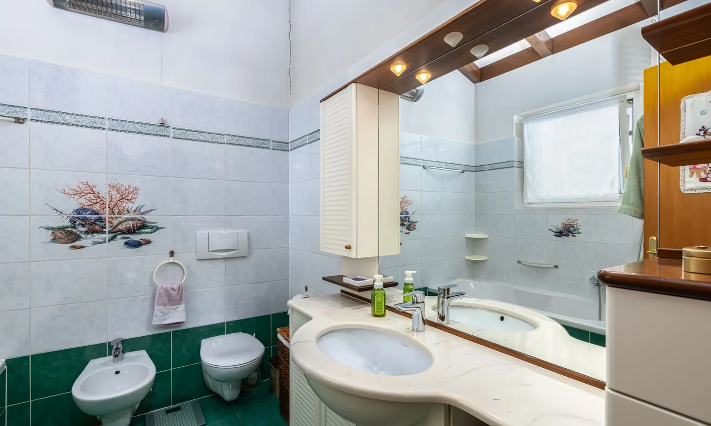 VILLA 4.5 LOC. IN BIOEDILIZA CON GIARDINO A RIVA SAN VITALE - Foto 9 di 9