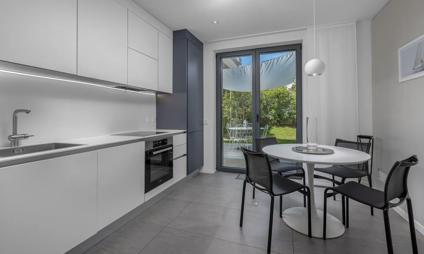 STUPENDO E MODERNO 2.5 CON GIARDINO PRIVATO A MASSAGNO - Foto 3 di 9