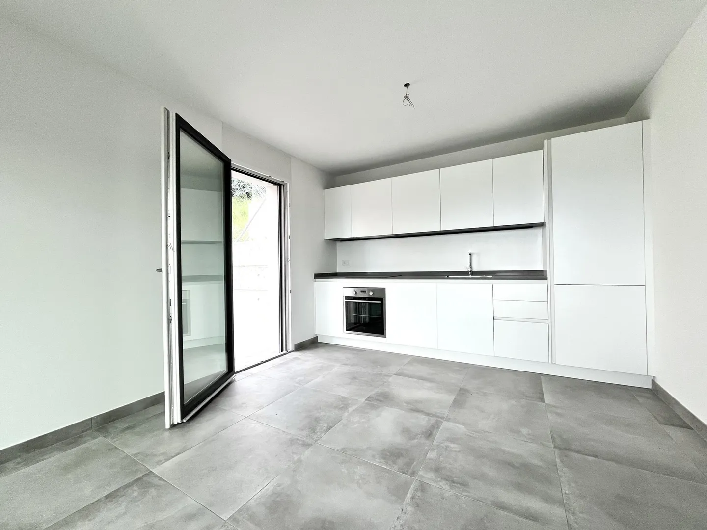 INVESTISSEMENT - NOUVELLES UNITÉS 2.5 AVEC TERRASSE À TESSERETE - Photo 1 sur 9