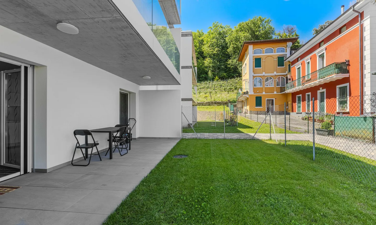 APPARTEMENT MODERNE 2.5 PIÈCES AVEC JARDIN À CASLANO - Photo 5 sur 10