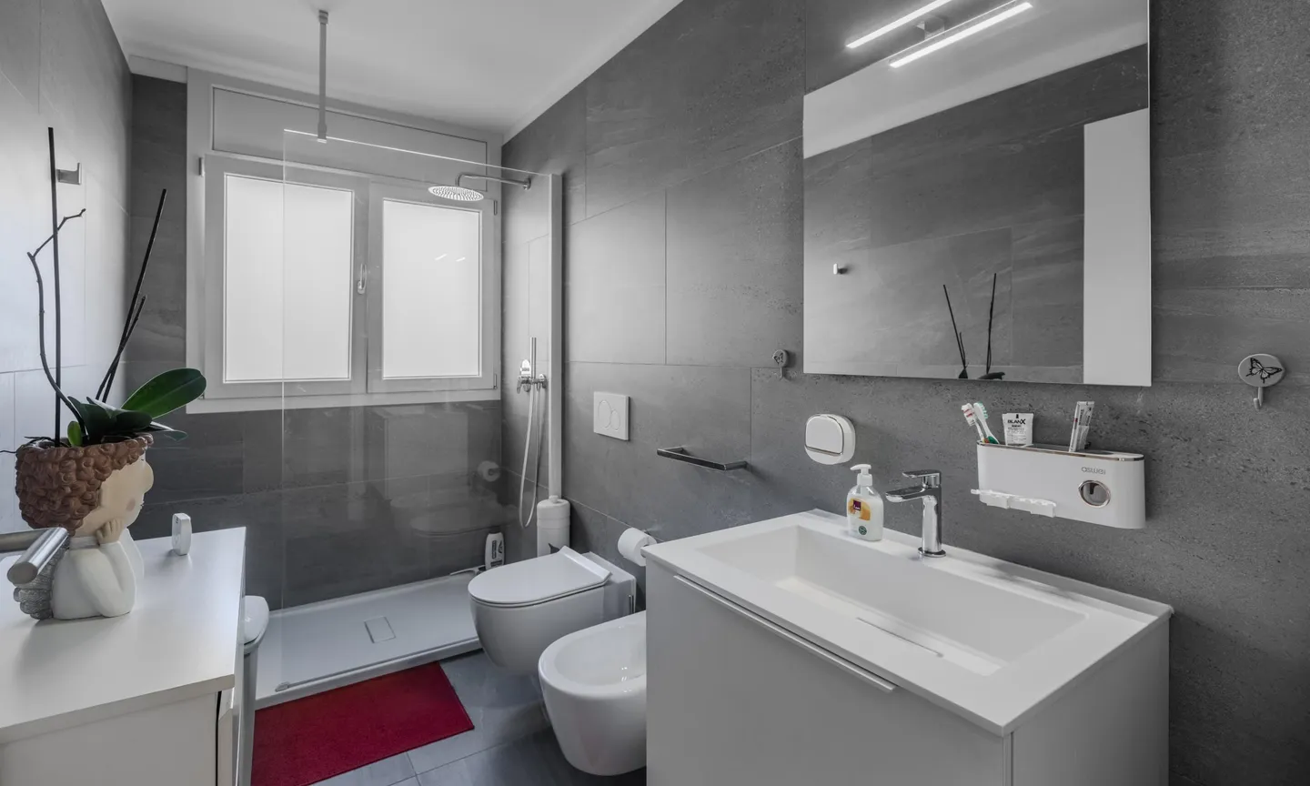 APPARTEMENT MODERNE 2.5 PIÈCES AVEC JARDIN À CASLANO - Photo 8 sur 10