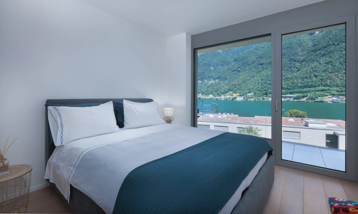 MODERNO 3.5 CON AMPIA TERRAZZA VISTA LAGO A RIVA SAN VITALE - Foto 8 di 9