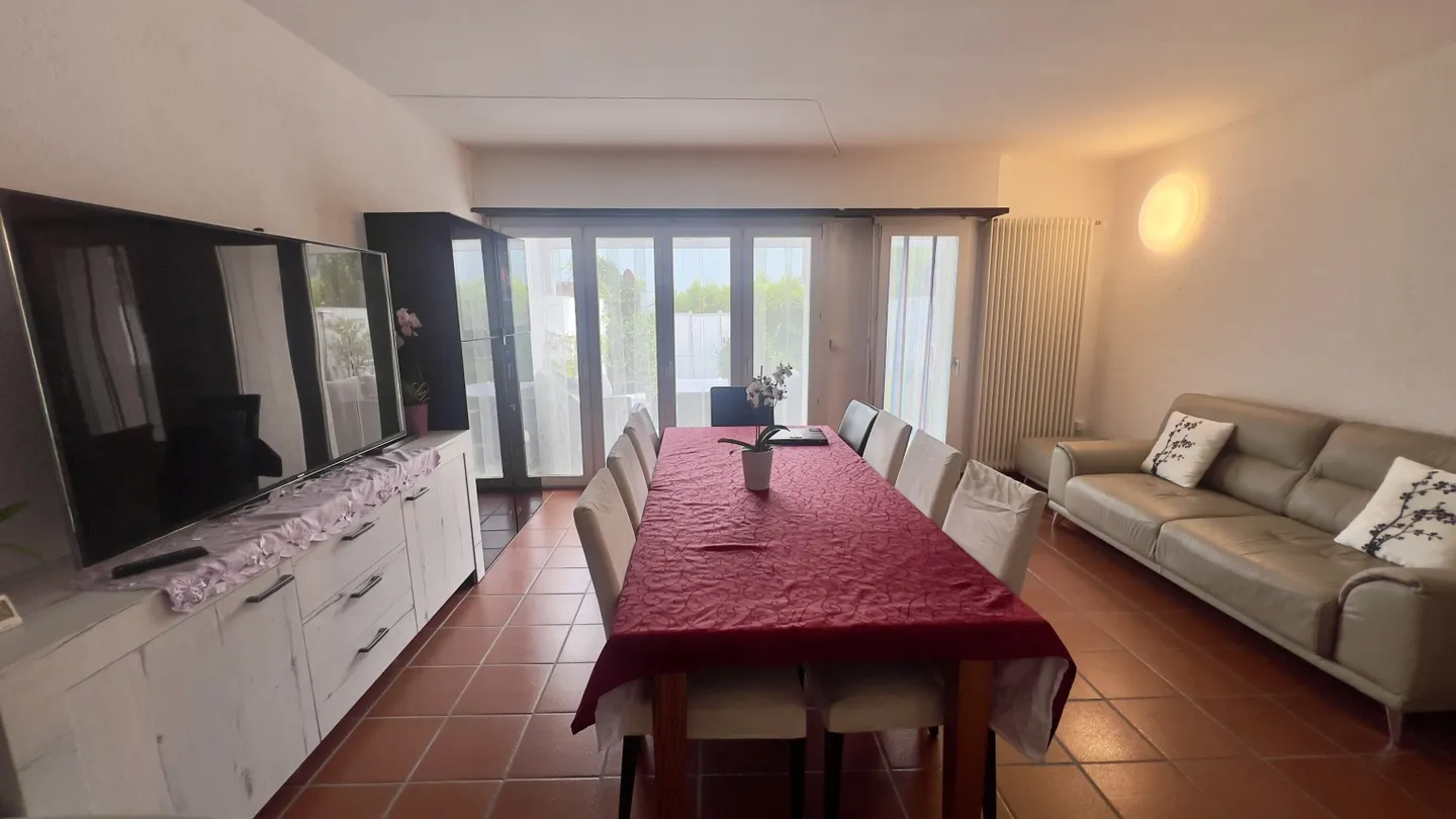END TERRACE HOUSE WITH 4.5 ROOMS ON 4 LEVELS IN AGNO - Photo 1 of 13