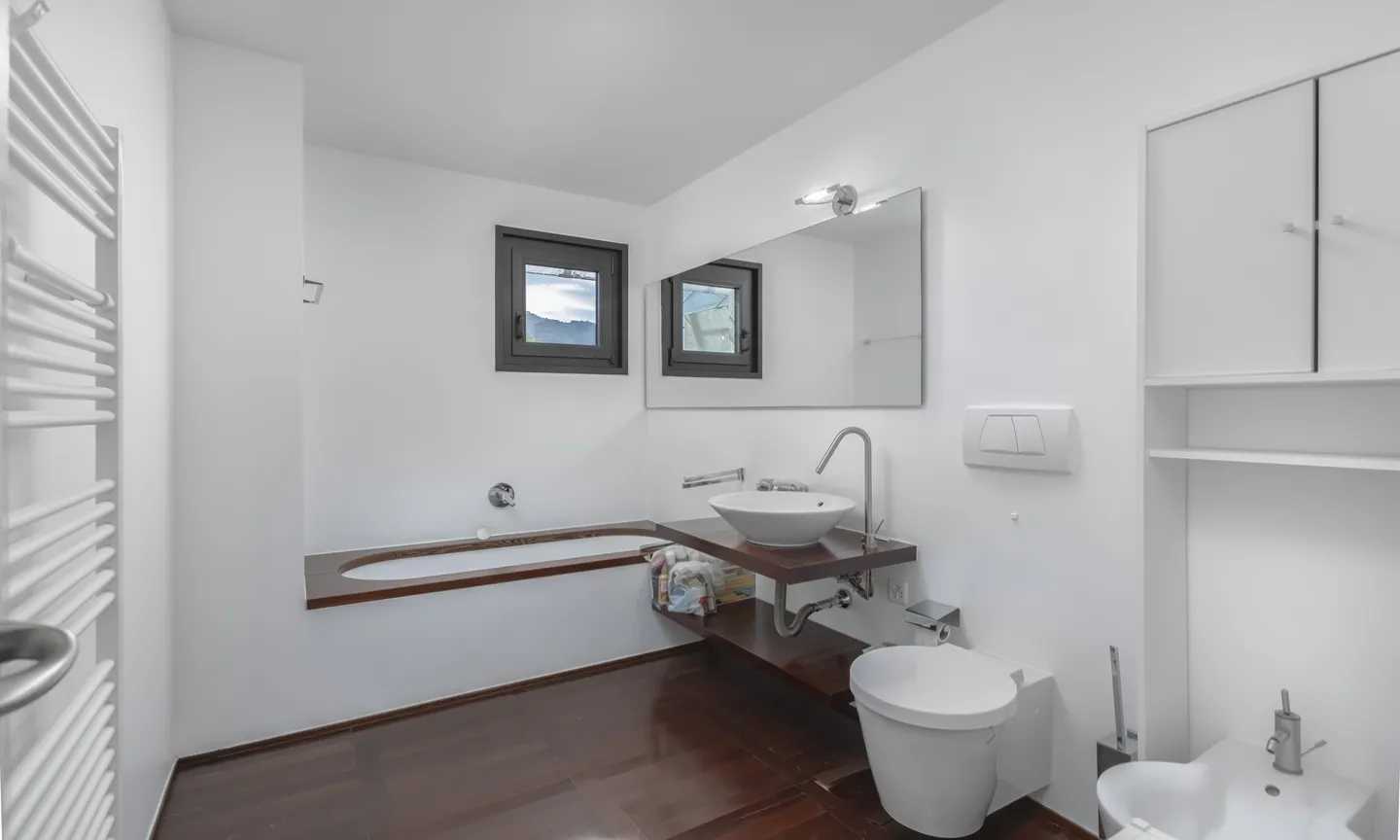 GRANDE ATTICO 4.5 LOCALI VISTA LAGO E PISCINA A MONTAGNOLA - Foto 8 di 10