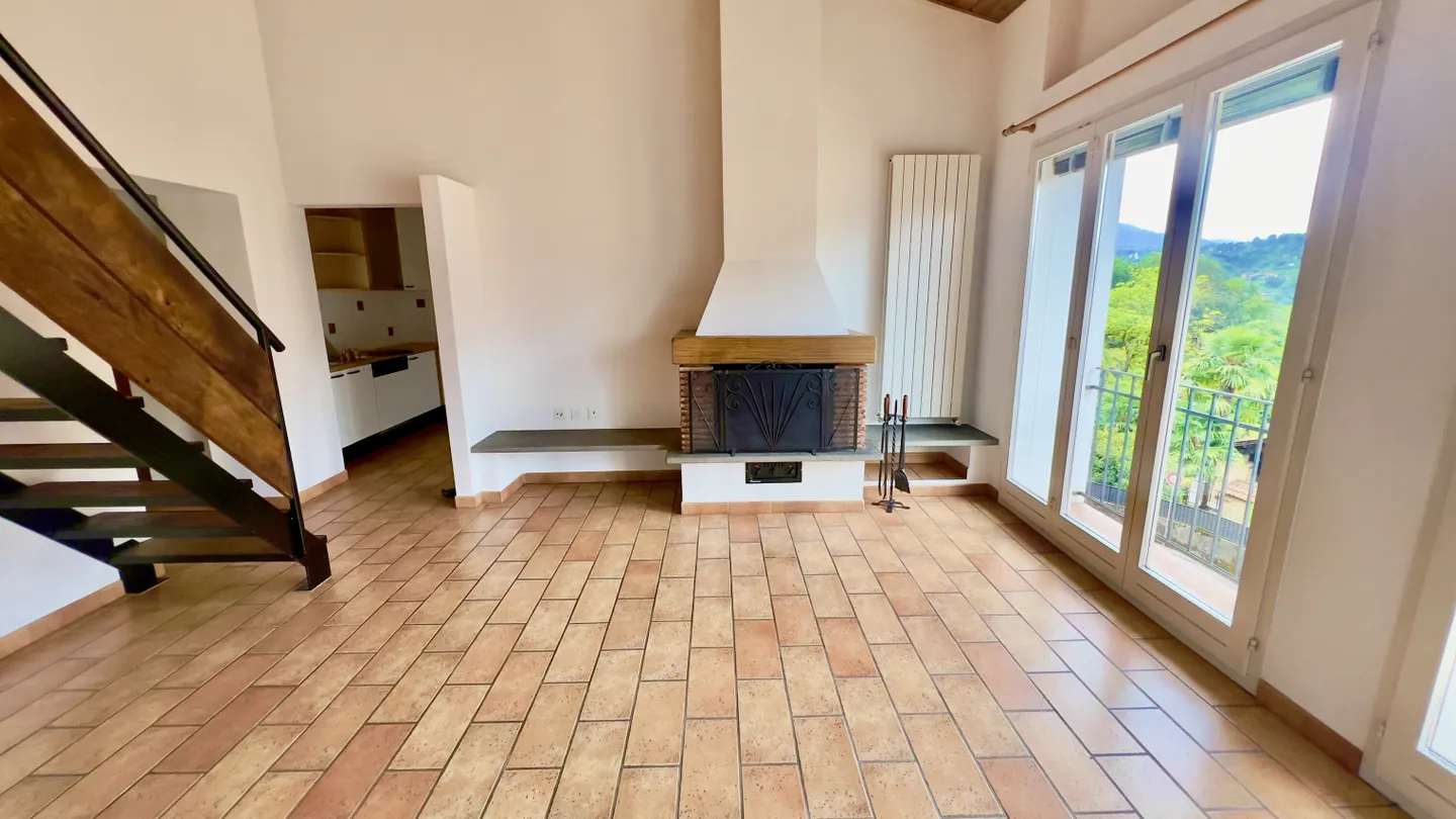 SPACIOUS 3.5-ROOM DUPLEX IN THE HEART OF PURASCA - Photo 2 of 11