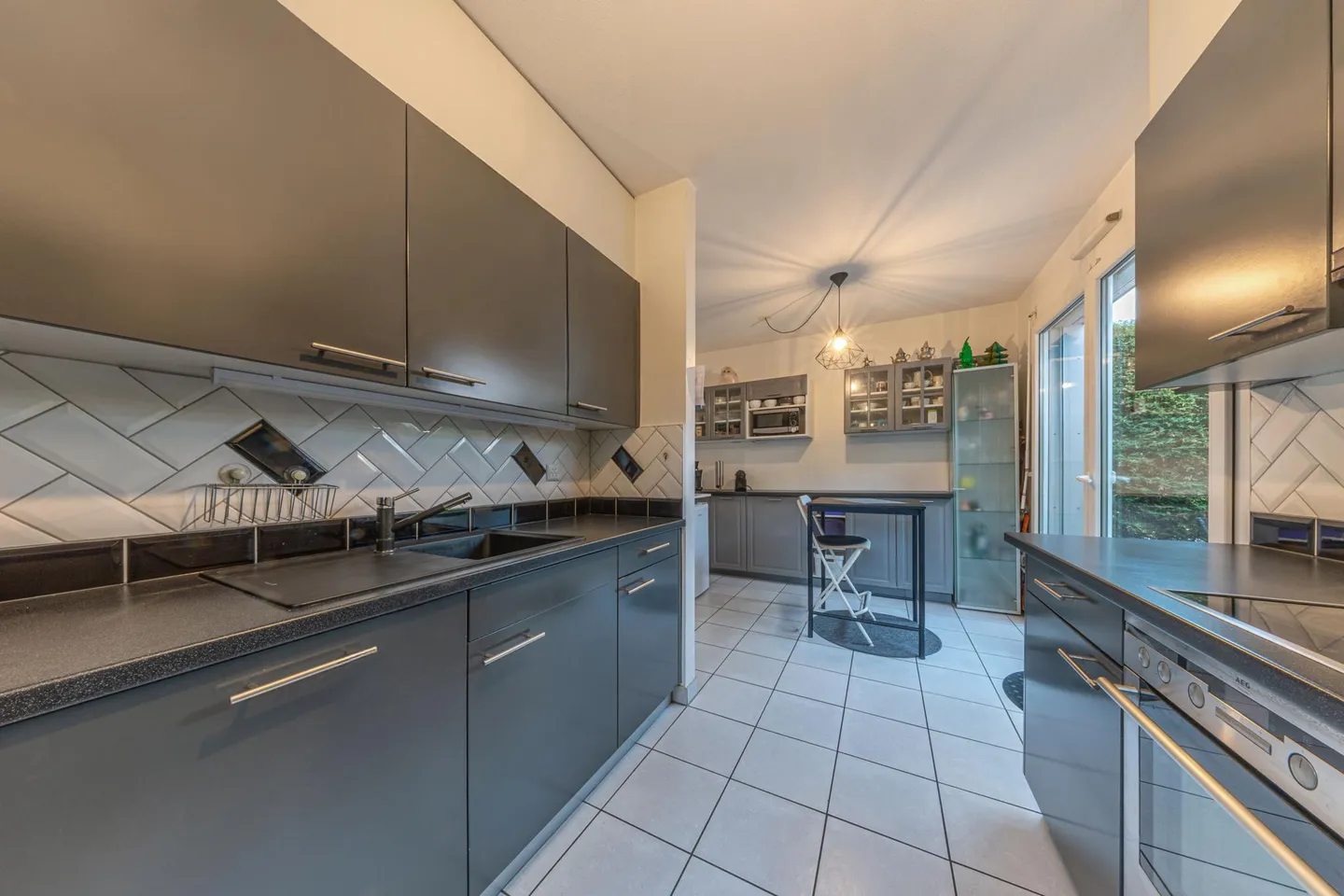 Triplex luminoso con giardino - Foto 3 di 7