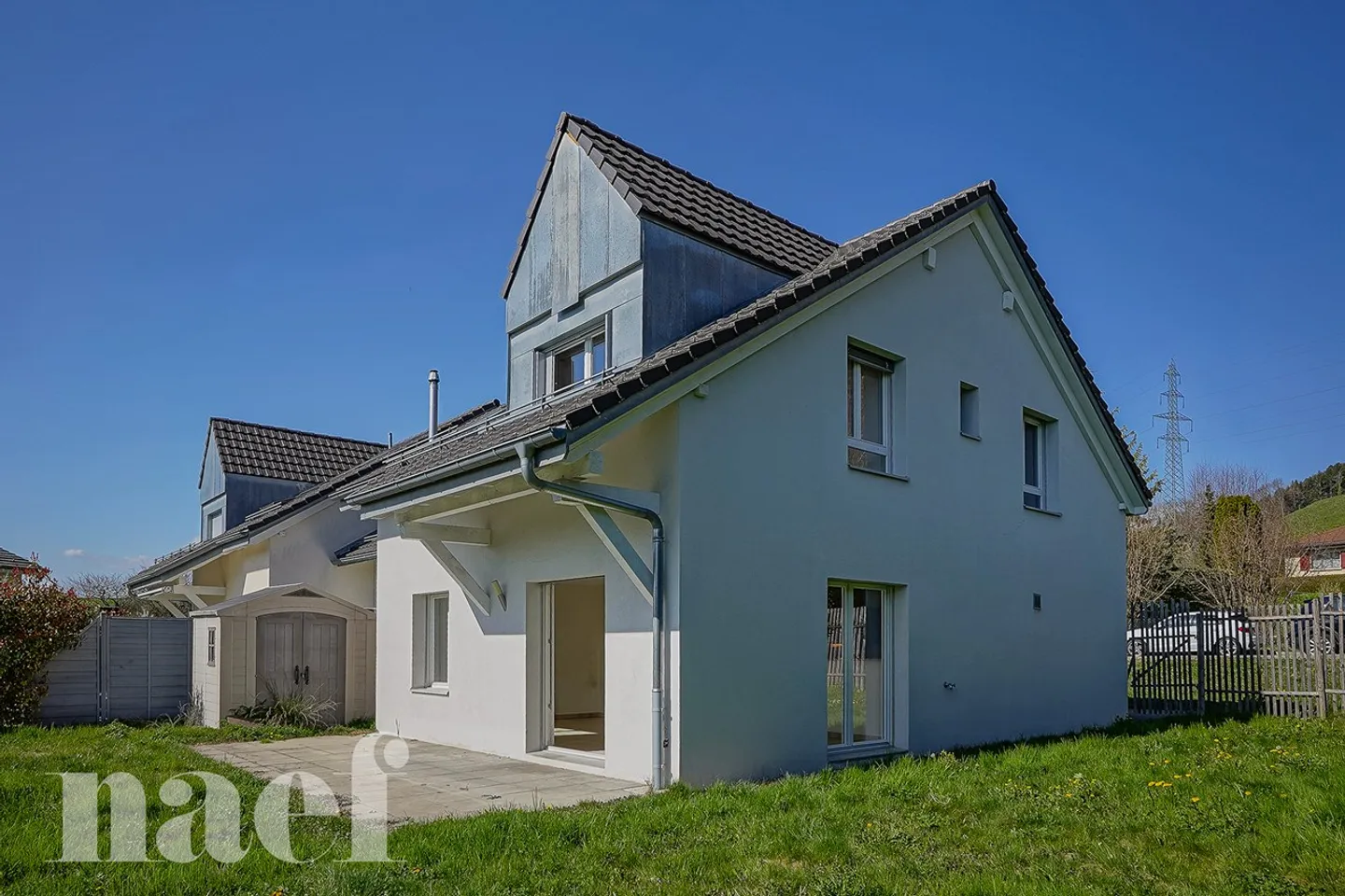 Charming semi-detached villa with garages of 5.5 rooms in a contemporary style and in a green setting for sale in Blonay - Photo 1 of 13