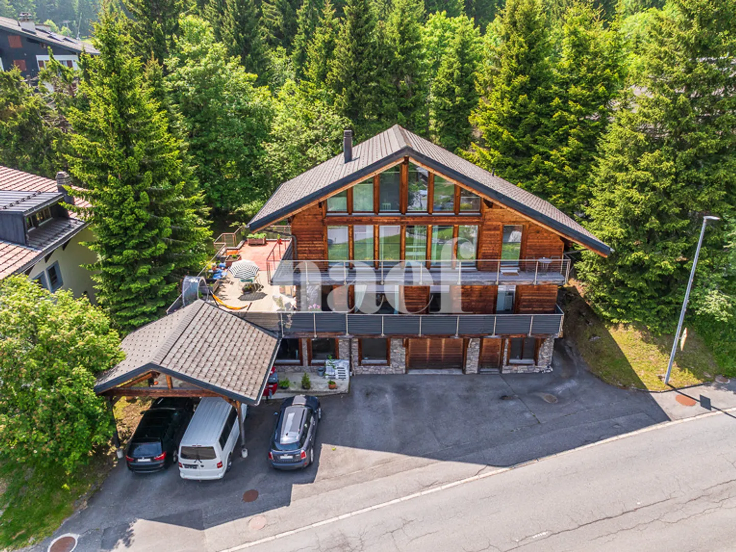 Chalet moderne et spacieux de 3 appartements à vendre à Morgins - Photo 1 sur 13