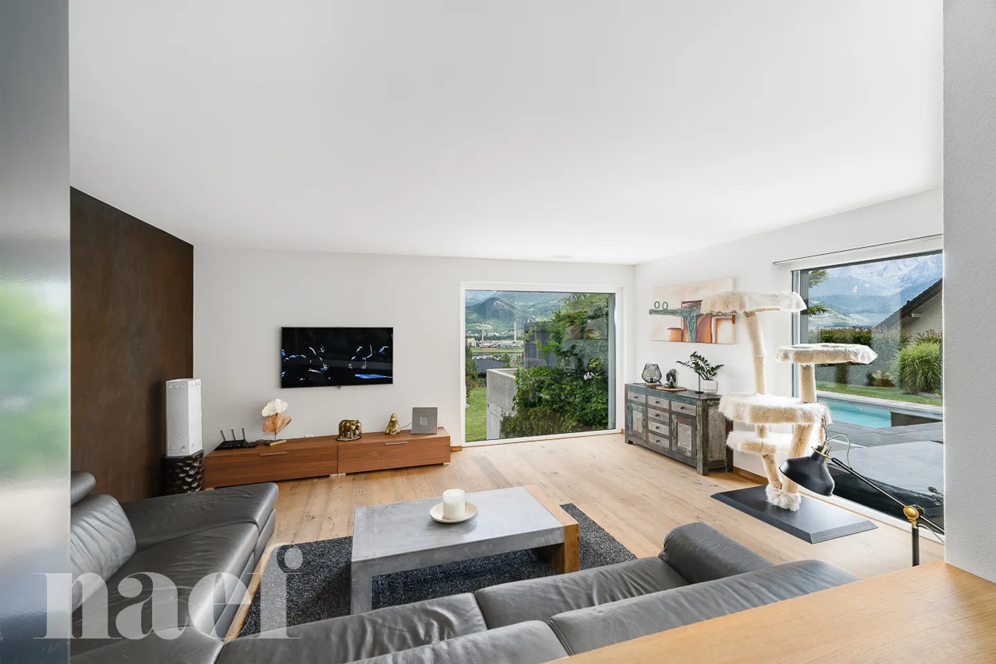 Architect-designed house with 7.5 rooms, pool, and jacuzzi in a green setting for sale in Collombey-Muraz - Photo 7 of 13