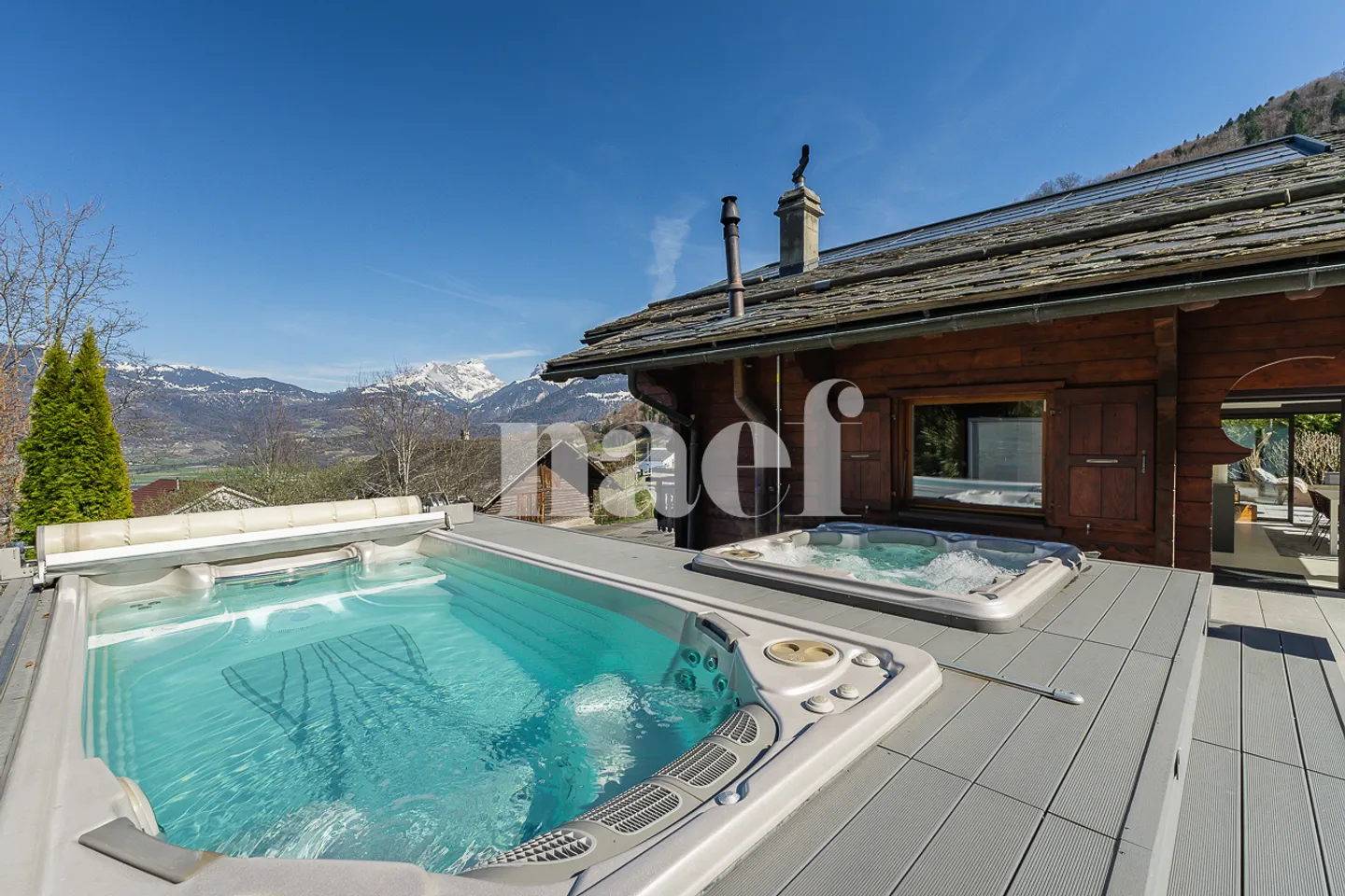 Magnificent renovated chalet with jacuzzi and counter-current pool for sale in Choëx - Photo 3 of 13