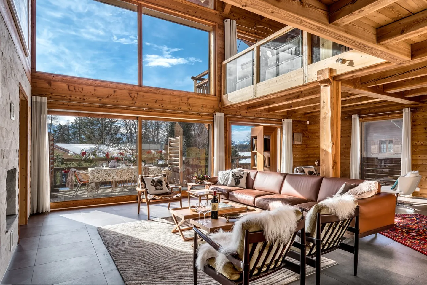 Light-filled Bayrou Chalet for sale in the Villars-sur-Ollon area - cathedral living room, exceptional volumes and perfect continuity between interior and exterior - Photo 2 of 13