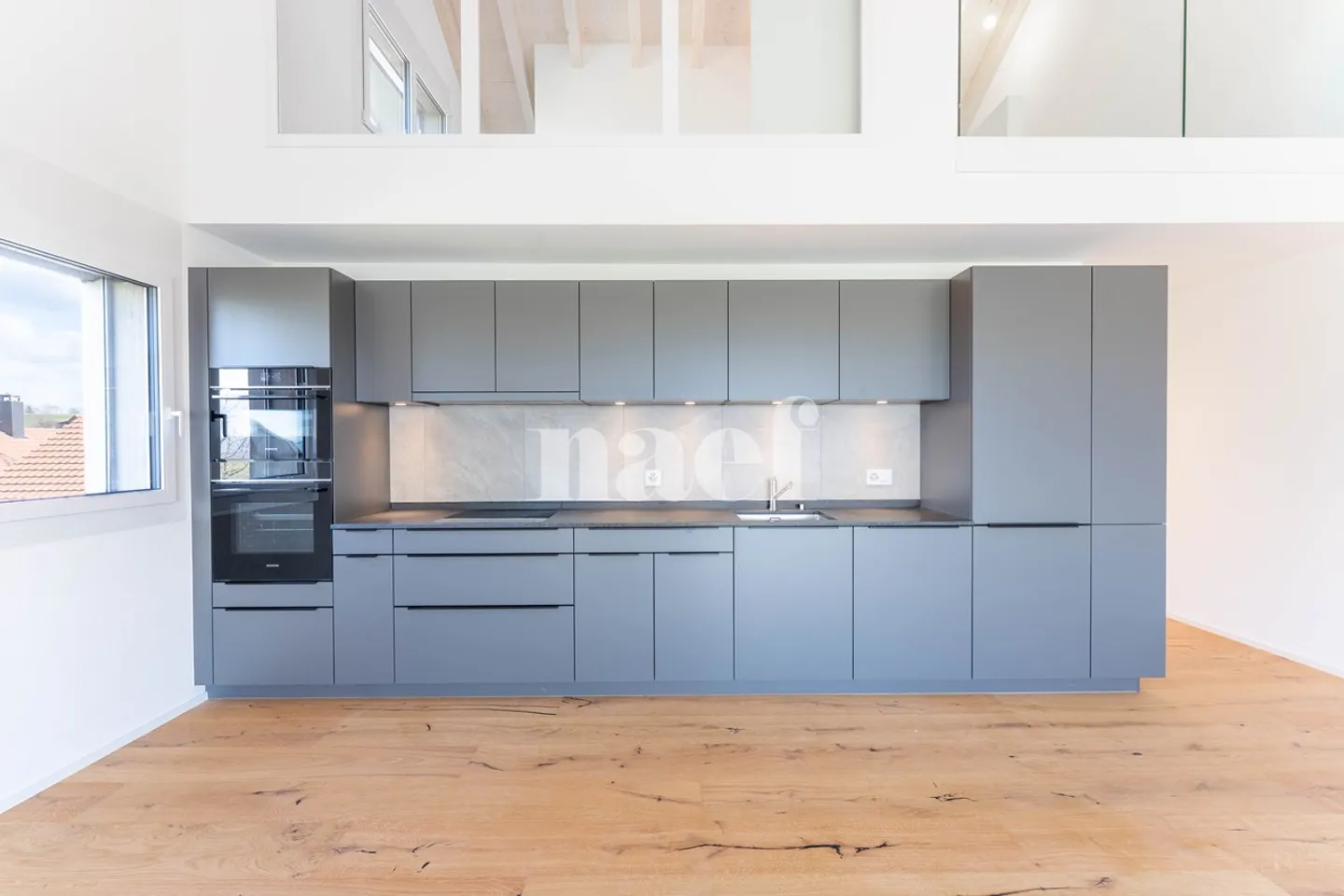 New 5.5-room duplex apartment with large balcony for sale in Prévonloup - Photo 3 of 10