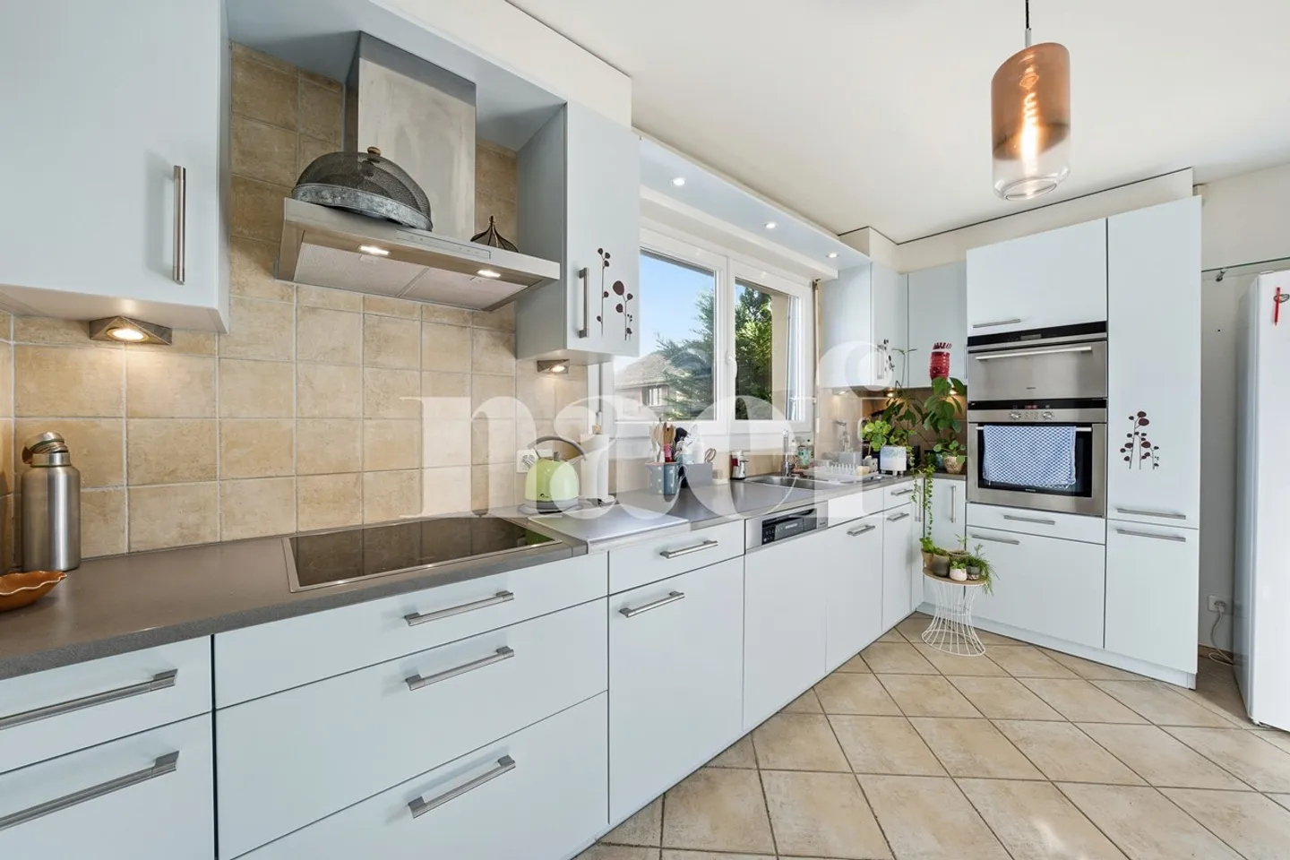 Maison individuelle dans un écrin de verdure - Photo 3 sur 10