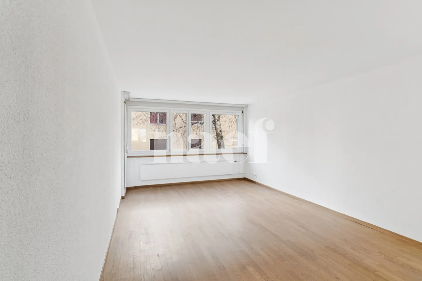 Appartement de 4.5 pièces au rez-supérieur - Photo 4 sur 8