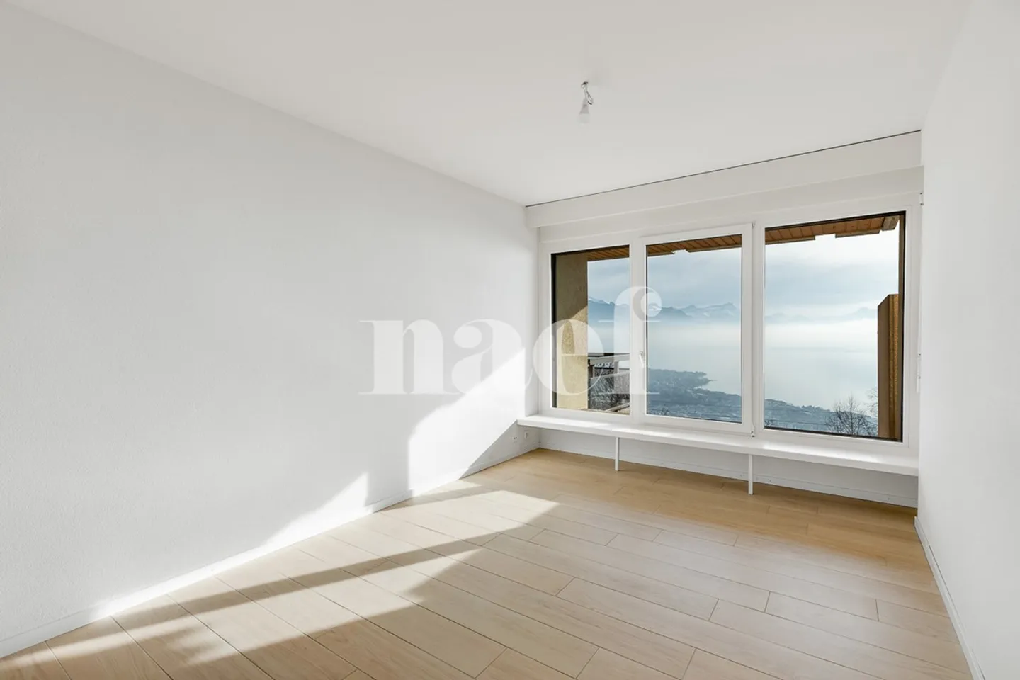 Appartement rénové de 2.5 pièces avec terrasse / jardin et vue panoramique sur le lac à vendre à Chardonne - Photo 7 sur 8