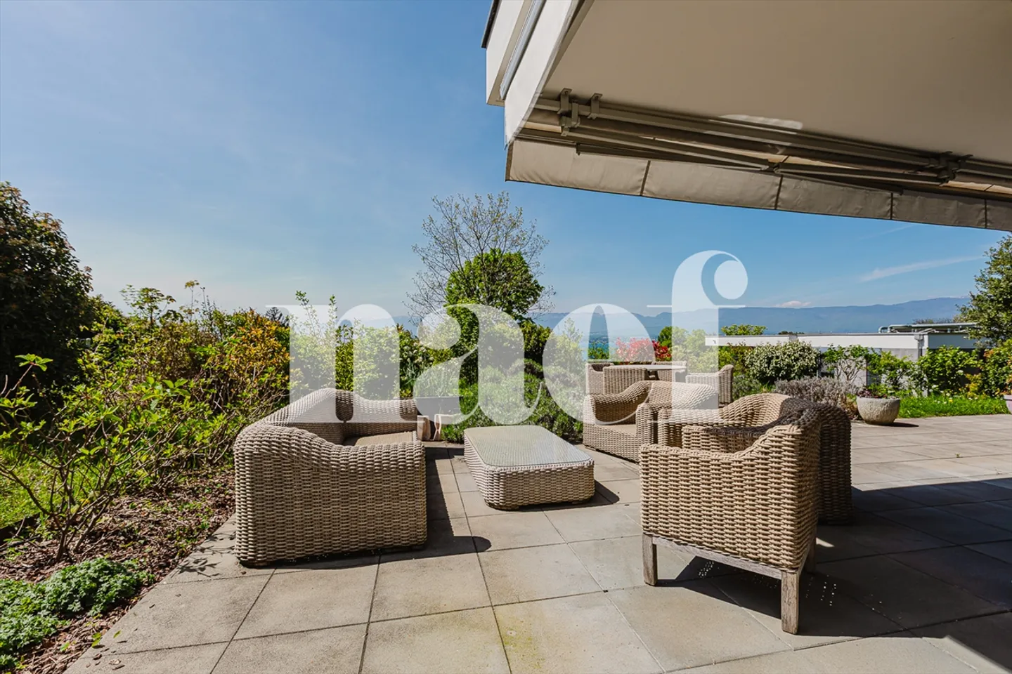 Modern garden-level apartment with stunning lake view. - Photo 3 of 10