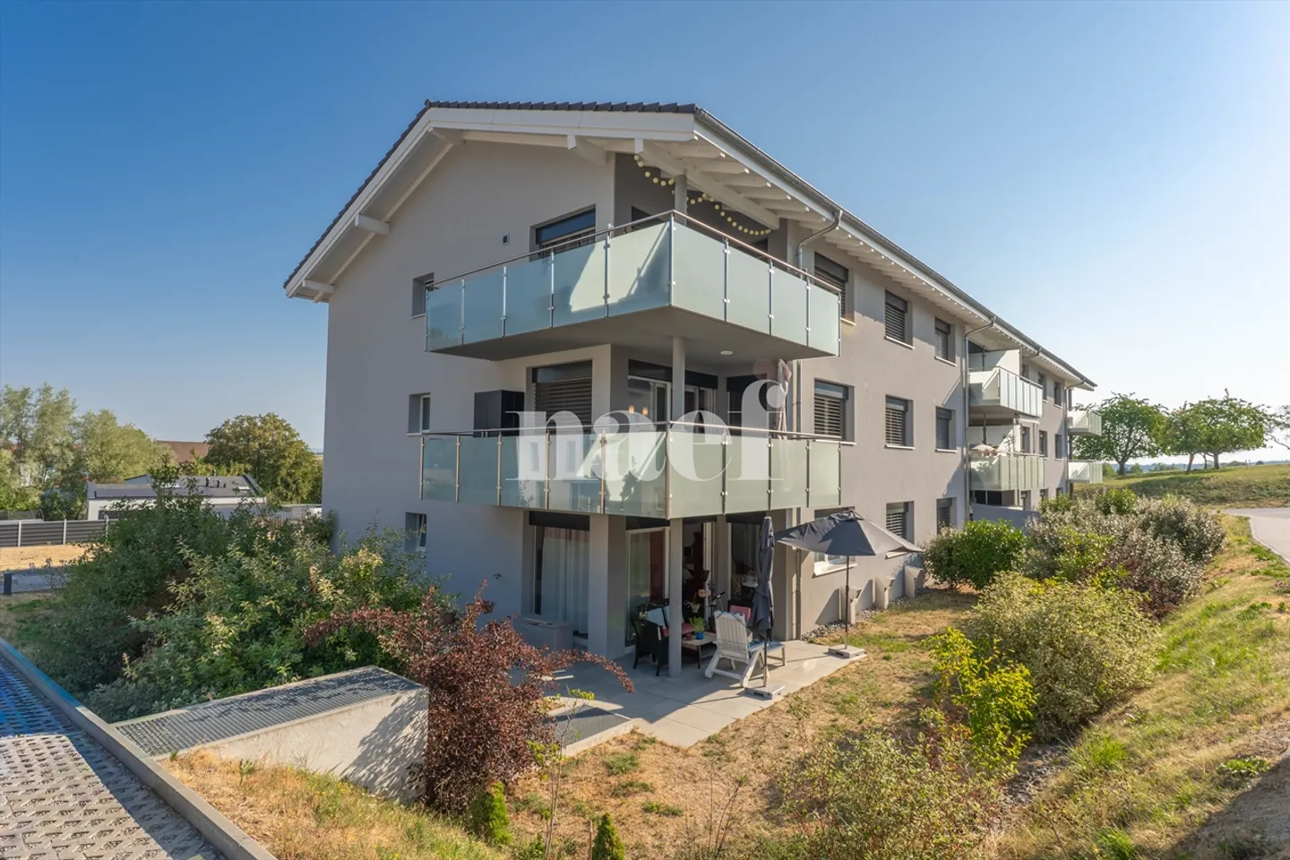 Appartement de 4.5 pièces au rez-de-chaussée avec terrasse et jardin à vendre à Prez-vers-Noréaz - Photo 1 sur 9