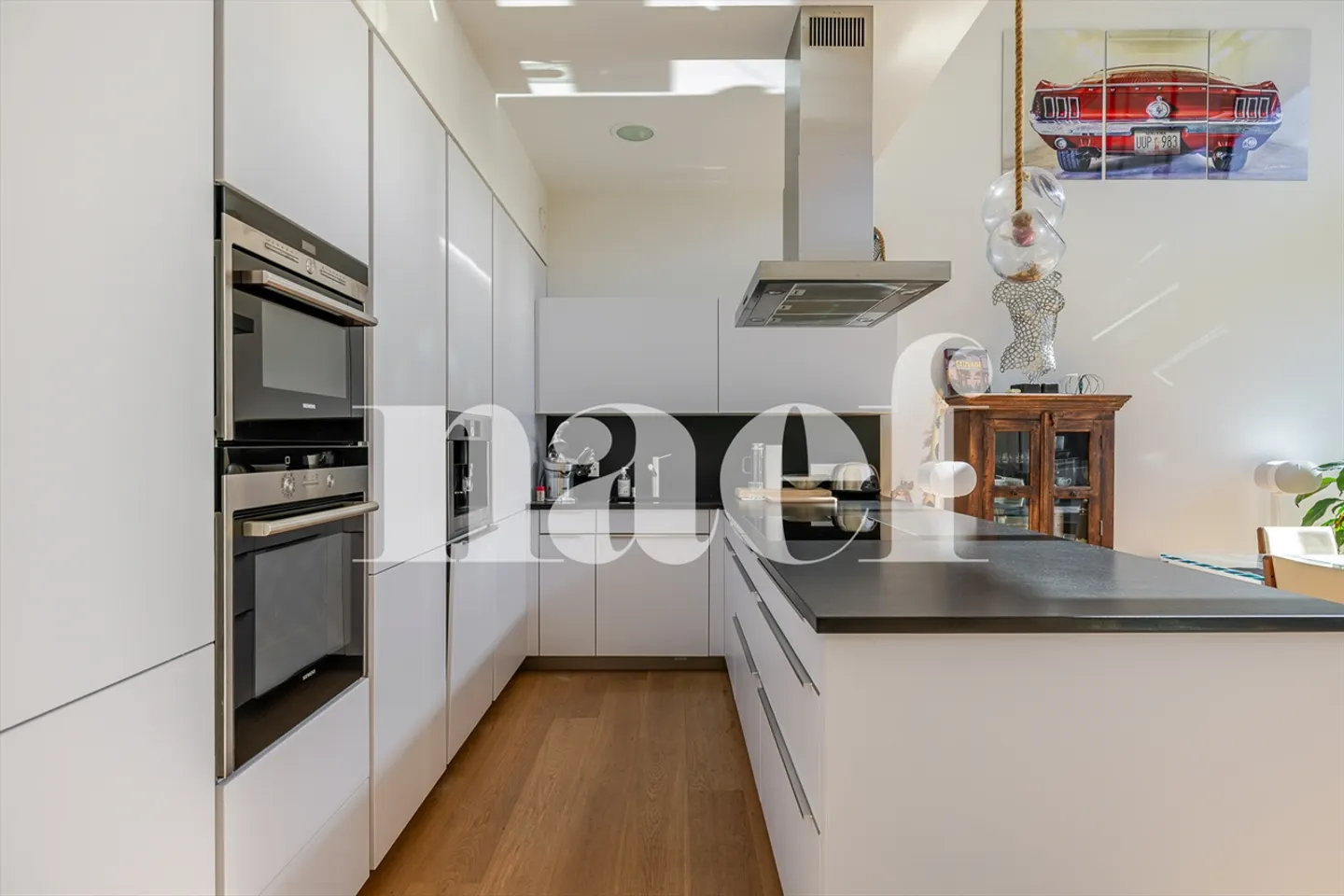 Superb 5.5-room duplex with terrace and exclusive amenities - Photo 4 of 13