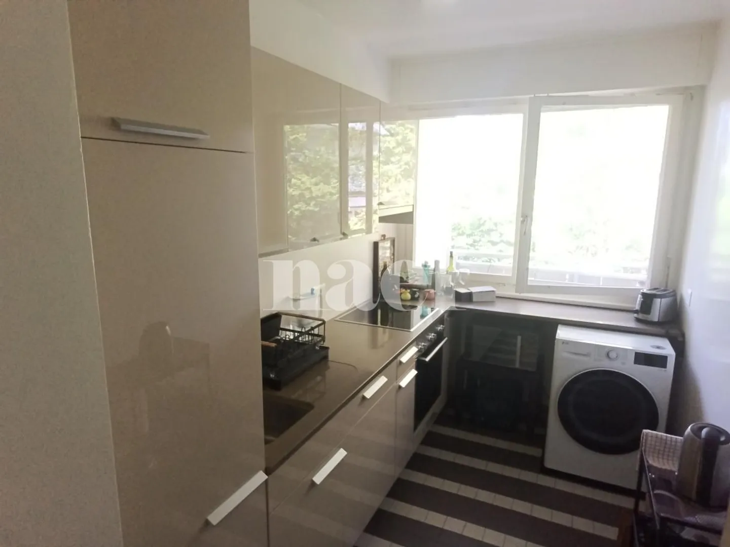 Appartement Charmant Près du Parc - Photo 3 sur 8