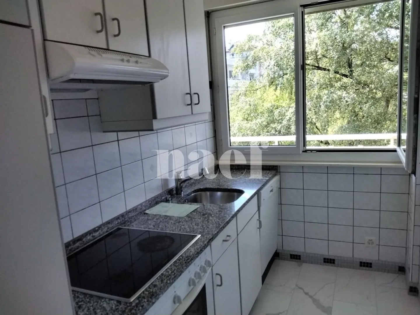 Appartement Charmant Près du Parc - Photo 3 sur 8