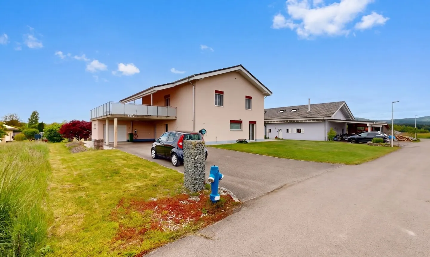 Magnifique maison familiale de 215 m² dans un cadre verdoyant à Bonfol - Photo 1 sur 11