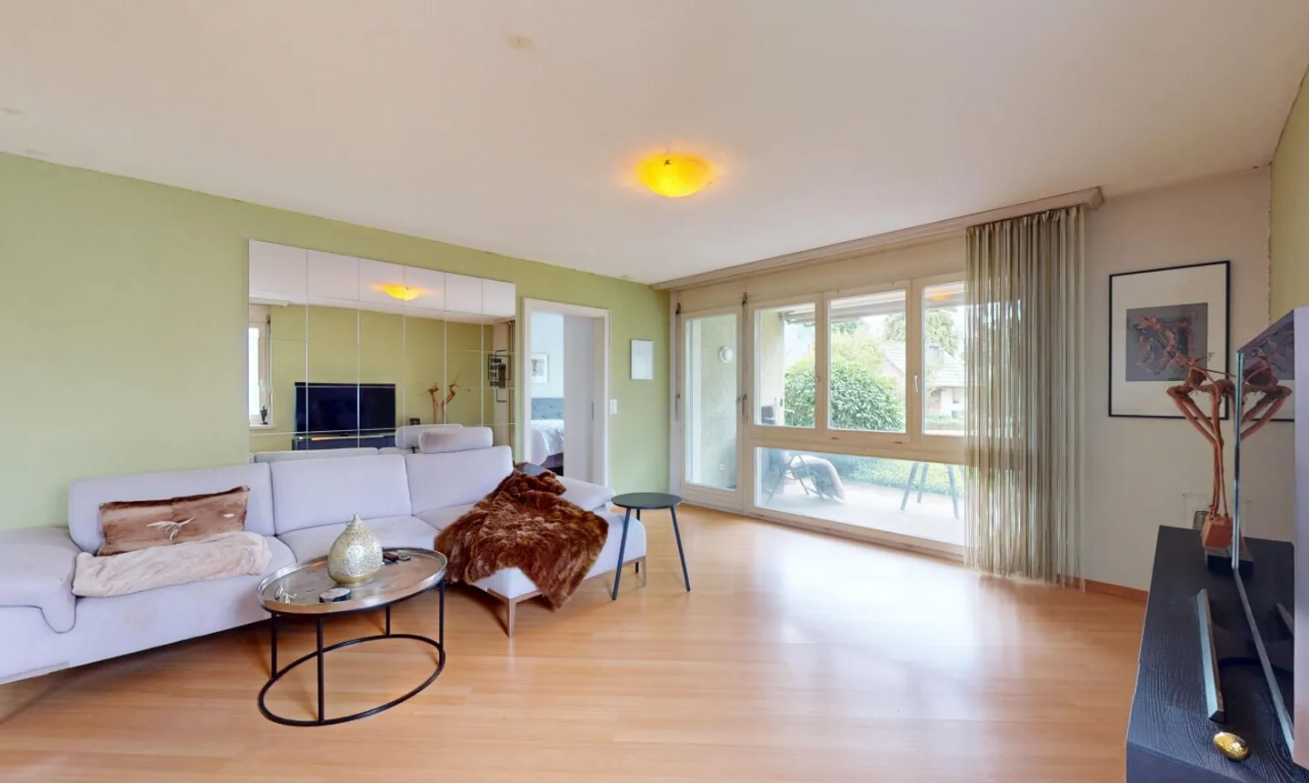 Wohngenuss mit Stil - 4.5-Zimmerwohnung mit Kamin, Terrasse &amp; Loggia - Foto 5 von 11