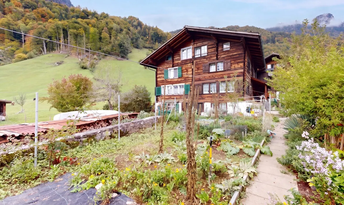 Two historic halves of a house with garden and mountain view in Luchsingen - Photo 2 of 13