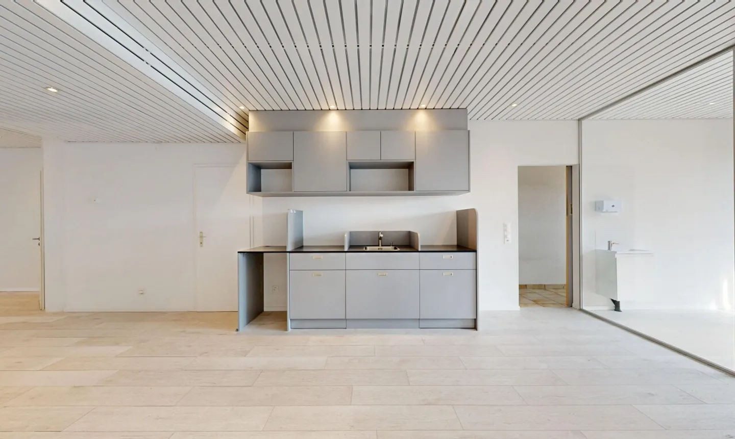 Immeuble mixte avec locaux commerciaux et appartement 3.5 pièces - Foto 4 von 11